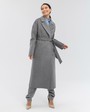 Пальто-халат длины maxi из плотной шерсти с кашемиром. Модель прямого силуэта с английским воротником.Пальто дополнено двумя вместительными карманами,без застежки с поясом из основного материала.