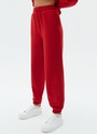 Джоггеры, цвет: красный Allweneed Джогеры на средней посадке. Эластичный пояс со шнурком и резинки внизу для комфортной посадки. Ткань очень приятна на ощупь и позволяет коже дышать. Носите со свитшотом из новой коллекции