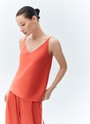 Топ на тонких бретелях, цвет: коралловый Allweneed
Топ на тонких бретелях. Прямой силуэт не слишком облегает, а V-образный вырез подчёркивает красоту шеи и ключиц. В лёгкой вискозе вам будет комфортно даже в жаркую погоду.