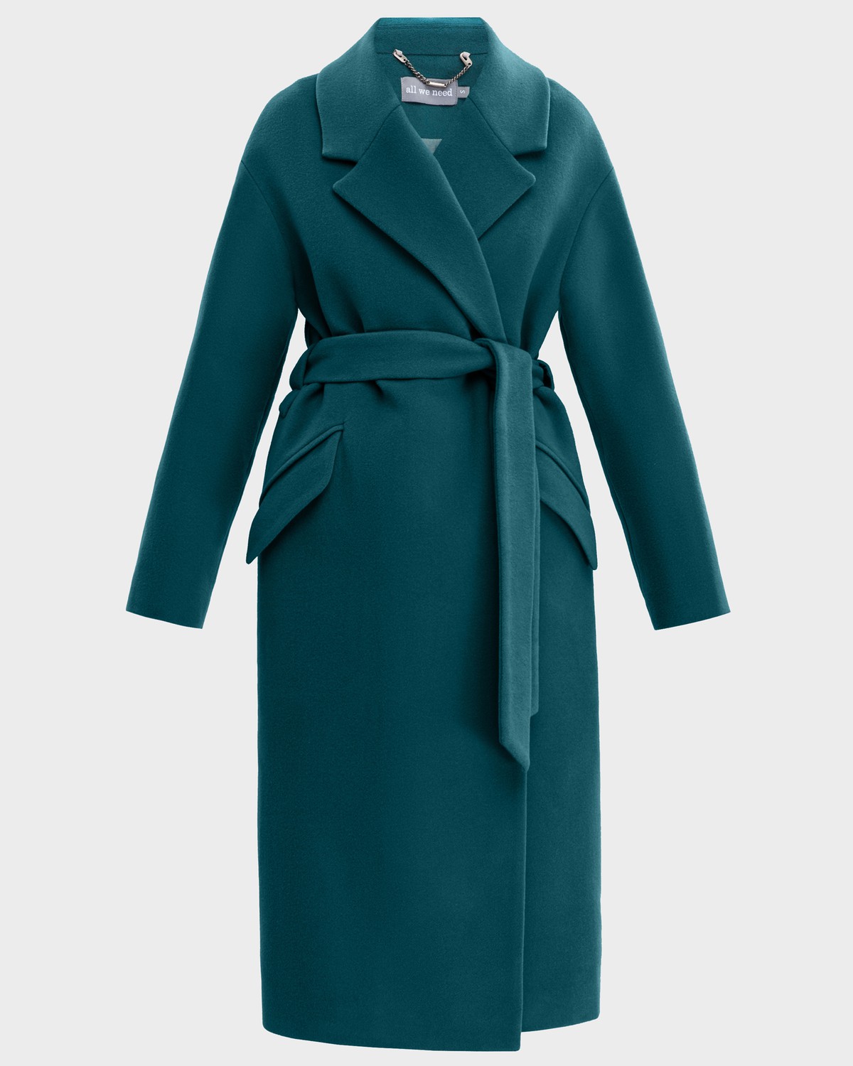 Зимнее пальто из плотной шерсти на подкладе из шерстепона. Модель прямого силуэта с английским воротником, дополнена двумя вместительными карманами,без застежки, с поясом из основного материала.

Температурный режим: до -10 градусов