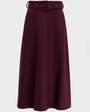 Юбка-трапеция длины миди. Дополнена широким поясом с обтяжной пряжкой в тон изделия. Обновленныйбестселлер нашей коллекции прекрасно сочетается с объемным верхом: блузами, свободными рубашками и жакетами.