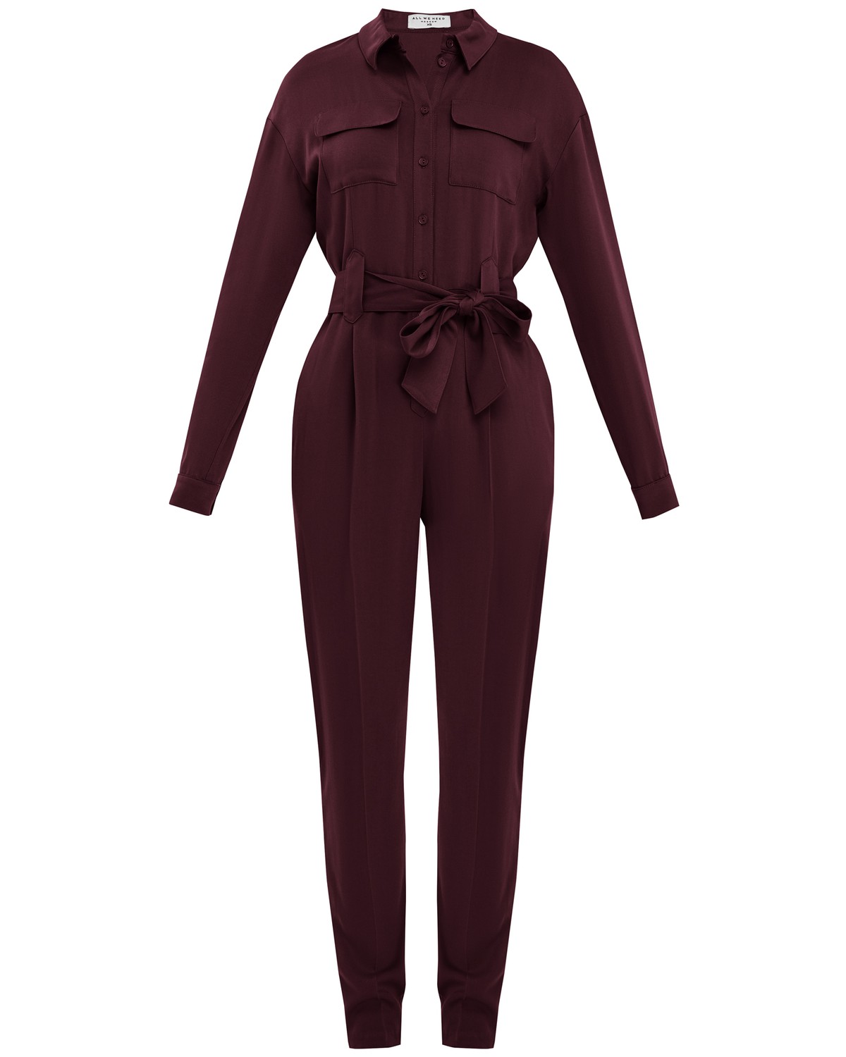 Комбинезон с длинным рукавом в стиле сафари из струящейся вискозы. Дополнен накладными карманами, пуговицами в тон, широким поясом и широкими шлевками. Комбинезон избавит Вас от вопроса: что надеть?. Он прекрасно сочетается с любой обувью, а также его можно дополнить Вашим любимым жакетом.

На модели размер XS