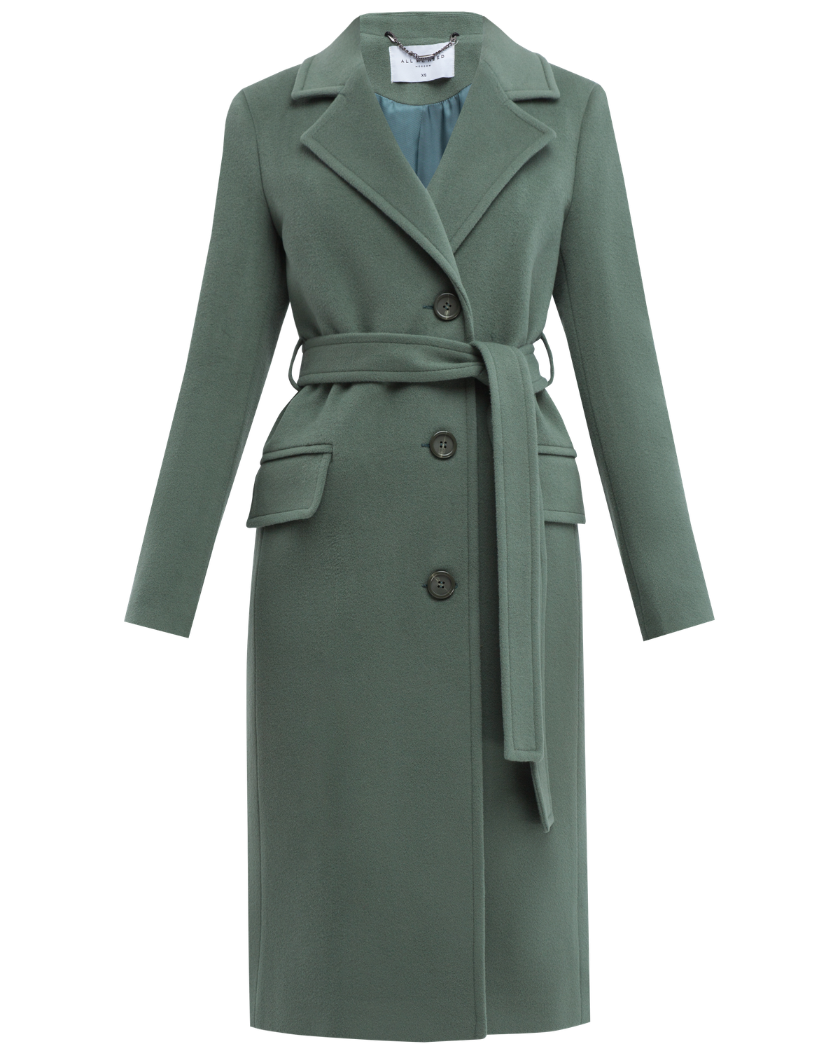 Пальто из плотной шерсти на подкладке. Модель прямого силуэта с английским воротником и классической линией плеча, застегивается на пуговицы, дополнено двумя вместительными карманами с клапаном и поясом в тон изделия. Модель средней длины хорошо смотрится как на миниатюрных, так и на высоких девушках.

На модели размер XS
