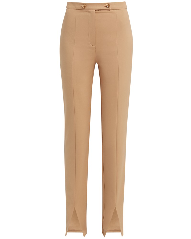 Брюки дудочки зауженные к низу. Брюки дополнены рельефными швами и разрезами спереди внизу, которые позволяют визуально удлинить ноги. Пояс декорирован двумя пуговицами в тон изделия.

На модели размер XS