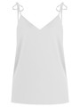 Топ в бельевом стиле оформлен аккуратным V-вырезом и тонкими бретельками на завязках. Универсальный выбор при создании повседневного, офисного и образа для выхода в свет. Сочетайте с юбкой в тон и лаконичными украшениями.

На модели размер XS