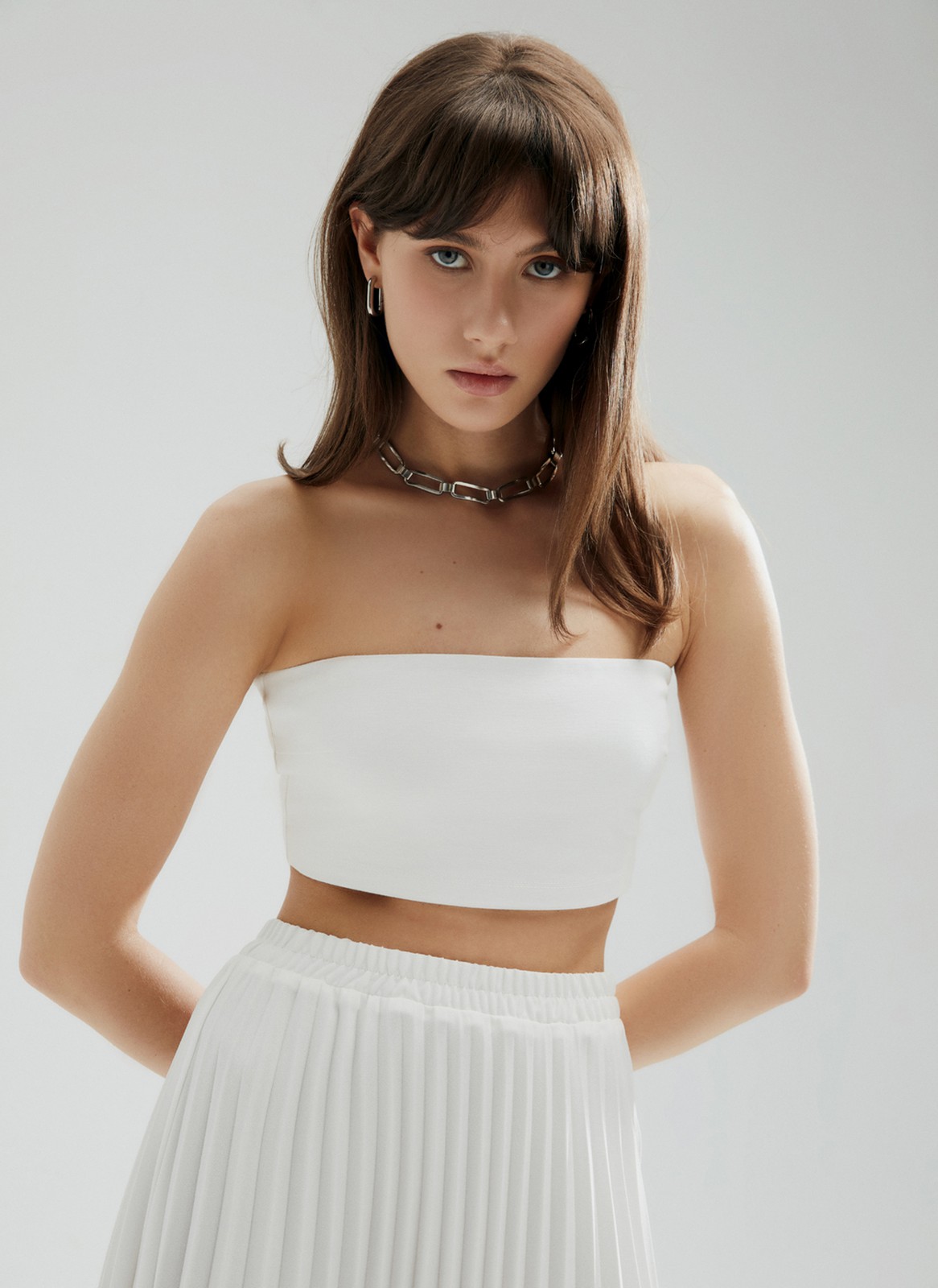 Бандо из кроёного трикотажа, цвет: молочный Allweneed
Топ-бандо из мягкого трикотажа. Носите с брюками и юбками на высокой посадке. Это простой способ сделать любой образ чуть более игривым. Два цвета на выбор: белый и черный.
На модели размер XS