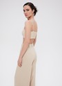 Бандо, цвет: бежевый Allweneed
Минималистичный топ-бандо из костюмной ткани. Тонкие бретели легко регулируются. Для лучшей посадки на спинке есть широкая резинка, вшитая в изделие. Топ выполнен из мягкой матовой ткани. Изделие дополнит образы с вечерними брюками и юбками, жакетами в мужском стиле и кардиганами.
На модели размер XS