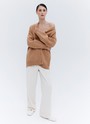 Кардиган Oversize , цвет: бежевый Allweneed
Удлиненный кардиган из мягкого и качественного трикотажа. Объемный крой оформлен V-образным вырезом для красивой зоны декольте и рядом роговых пуговиц. Свободный рукав почти не ощущается на руке и не ограничивает вас в движении. Модель подойдет для создания повседневных и выходных образов.