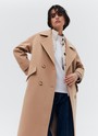 Пальто-кокон двубортное из шерсти и кашемира, цвет: кэмел Allweneed Свободное пальто из премиальной шерсти на пуговицах. Мы выполнили модель из итальянской шерсти и нежного кашемира, который дарит благородный сатиновый блеск. Актуальный силуэт кокон, длина миди и шлица сзади для удобства движений. Линия плеча немного спущена, застежка на четыре контрастные пуговицы и прорезные по диагонали карманы с клапанами. Пальто дополнит осенние образы с джинсами и брюками, с платьями-свитерами и высокими сапогами.
Температурный режим до +5 C
На модели размер XS