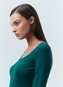 Боди с круглым вырезом, цвет: изумрудный Allweneed
Боди из нежного трикотажа с приятной на ощупь текстурой. Благодаря тонкой и эластичной ткани модель хорошо садится по фигуре. Круглый, глубокий вырез и удлиненный рукав. Мы сделали удобную застежку на кнопках для регулирования длины изделия. Если вы искали способ сделать образ лаконичным, но чуть более чувственным, чем с обычной футболкой или лонгсливом, обратите внимание на боди. Можно сочетать с любым низом: юбкой, брюками или джинсами.