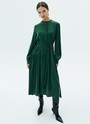 Платье миди со сборкой на юбке, цвет: зеленый Allweneed
Платье-миди с юбкой на складке. Воздушные рукава с манжетами. Мы сделали акцент на талии для женственного и романтичного силуэта. Есть съемный пояс. Закрытое декольте добавляет нотку ретро-духа. Ткань красиво струится при ходьбе. Эту модель легко стилизовать как для образа в офис, так и для свидания вечером. Сочетайте с аккуратной обувью и лаконичными украшениями.
На модели размер XS