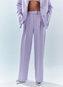 Брюки широкие полной длины, цвет: лавандовый Allweneed Брюки на средней посадке полной длины. Скрытая застёжка на молнию. Модель свободного кроя делает силуэт визуально стройнее. Приятная к телу костюмная ткань хорошо держит форму и обеспечивает правильную посадку по фигуре. Мы рекомендуем сочетать брюки с жакетом из новогодней коллекции, дополняя комплект броскими украшениями в праздничную ночь и топом в рубчик в будничной жизни. Представлены в трёх цветах: сиреневый рассказывает о тихом утре 1 января, красный апельсин символизирует мандарины и гирлянды, а белый это чистый зимний снег.
