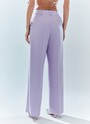 Брюки широкие полной длины, цвет: лавандовый Allweneed Брюки на средней посадке полной длины. Скрытая застёжка на молнию. Модель свободного кроя делает силуэт визуально стройнее. Приятная к телу костюмная ткань хорошо держит форму и обеспечивает правильную посадку по фигуре. Мы рекомендуем сочетать брюки с жакетом из новогодней коллекции, дополняя комплект броскими украшениями в праздничную ночь и топом в рубчик в будничной жизни. Представлены в трёх цветах: сиреневый рассказывает о тихом утре 1 января, красный апельсин символизирует мандарины и гирлянды, а белый это чистый зимний снег.