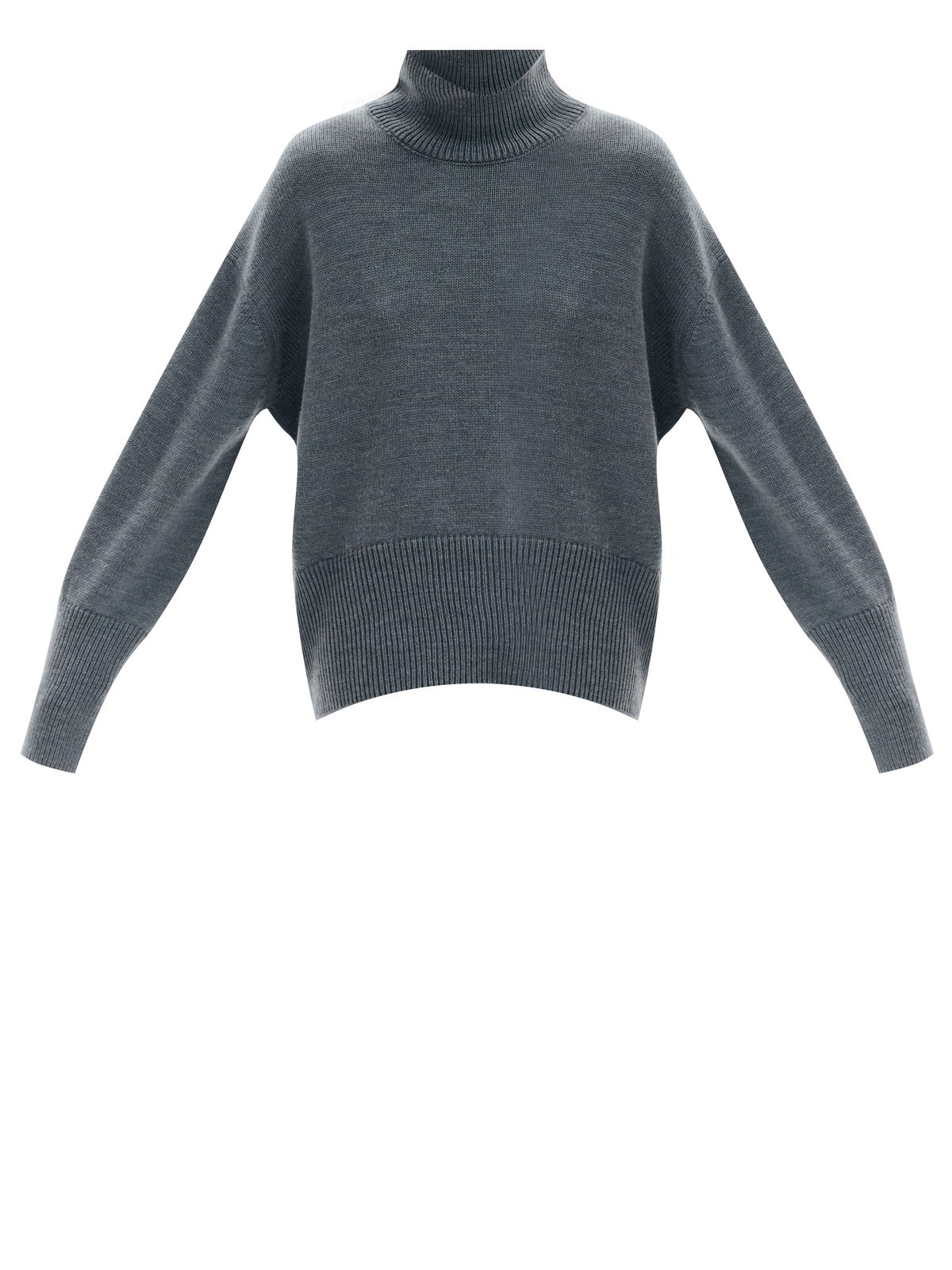 Шерстянойджемпер oversize. Высокая горловина оформлена ребристой окантовкой для уютного образа и защищает от сильного ветра, а спущенное плечо позволяет носить джемпер с футболками и водолазками для тепла. Модель легко садится под пальто с отложным воротником и заменяет шарф при плохой погоде. Джемпер станет отличным дополнением базового гардероба.