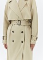 Тренч, цвет: бежевый Allweneed Плащ двубортного кроя с застёжкой на крупные контрастные пуговицы. Мы сохранили все детали классической модели: отлетную кокетку, А-силуэт, манжеты для фиксации рукава и длинный пояс на талии. Мы любим плащ за то, что с ним можно составлять женственные и универсальные повседневные образы.